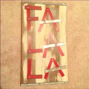 Two 14x25 FA LA LA wood sign